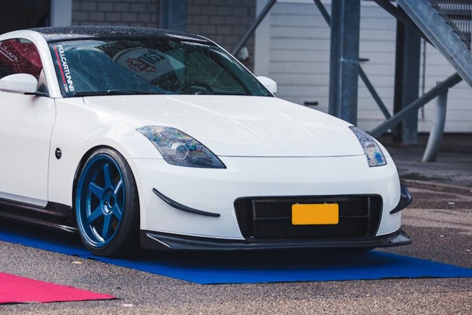 Image of SK-Import Voor Bumper Nismo 2 Style Carbon Lip & Canards Fiberglass Nissan 350Z