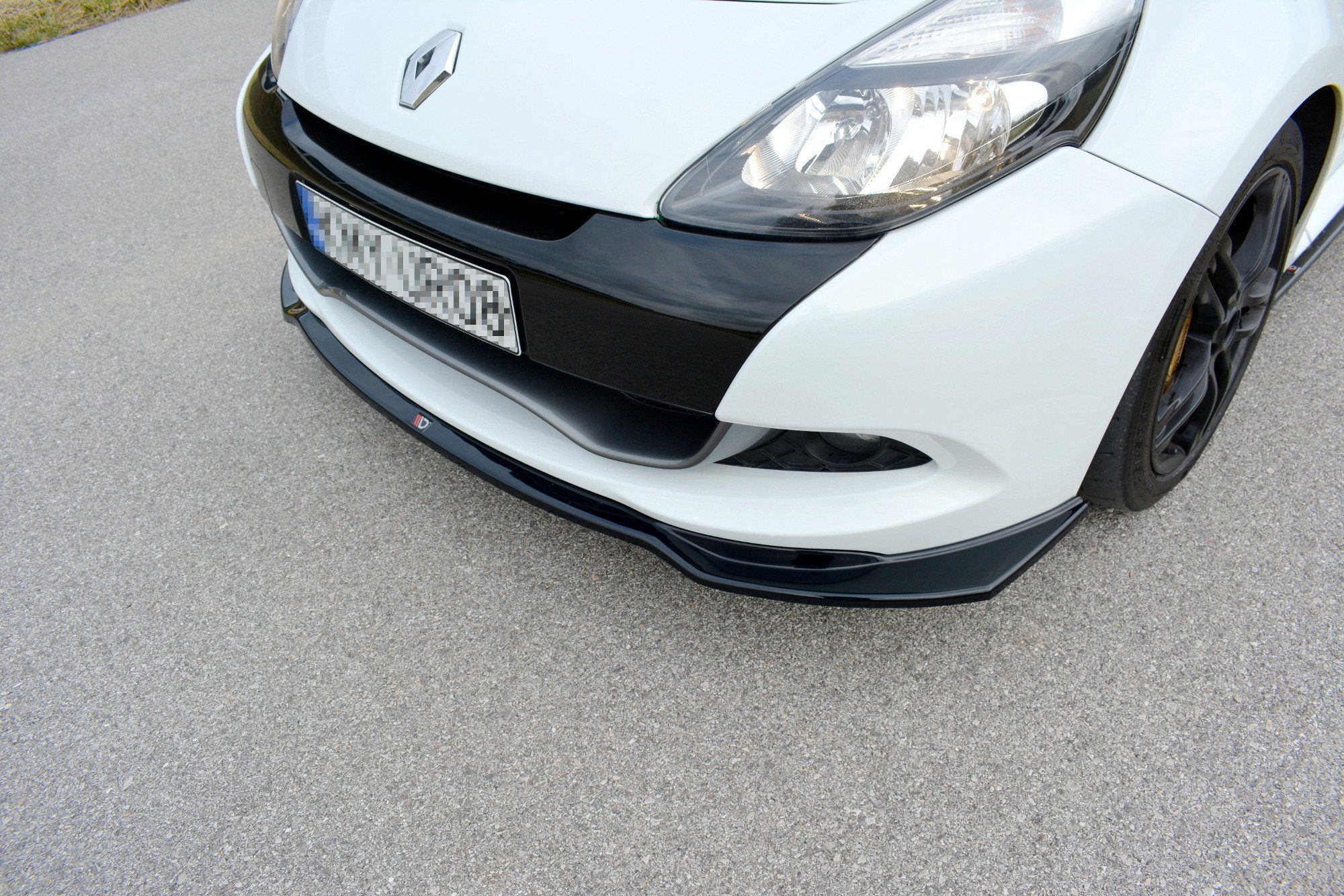 Image of Maxton Voor Bumper Lip V1 Glanzend Zwart ABS Plastic Renault Clio Facelift