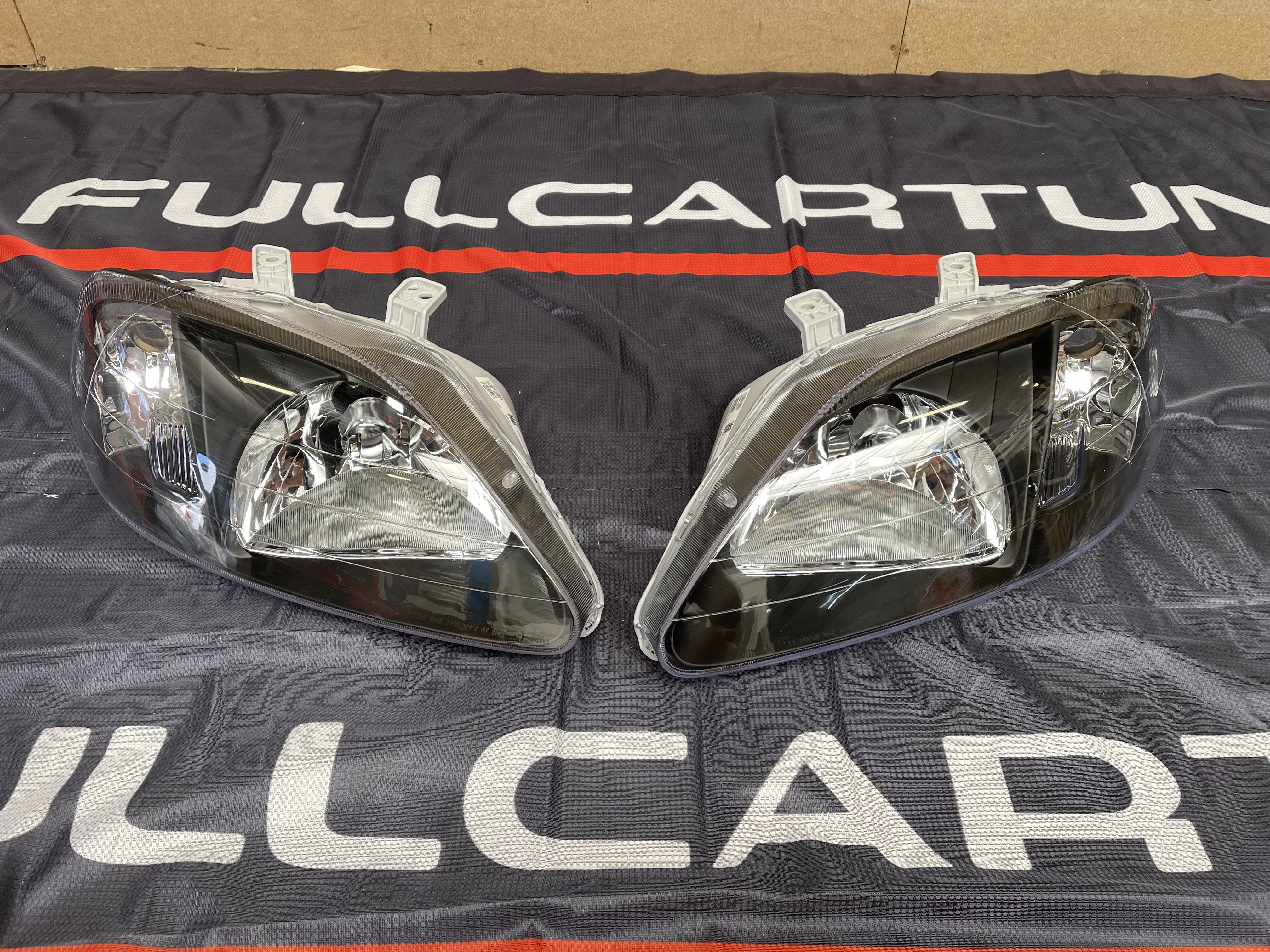 Image of SK-Import Koplampen JDM Style TWEEDE KANS Black Housing Honda Civic Facelift
