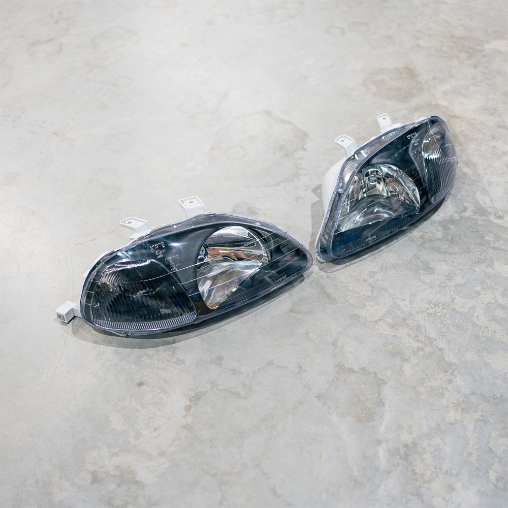 Image of TYC Koplampen JDM TWEEDE KANS Black Housing Honda Civic Pre-Facelift 1996-1998