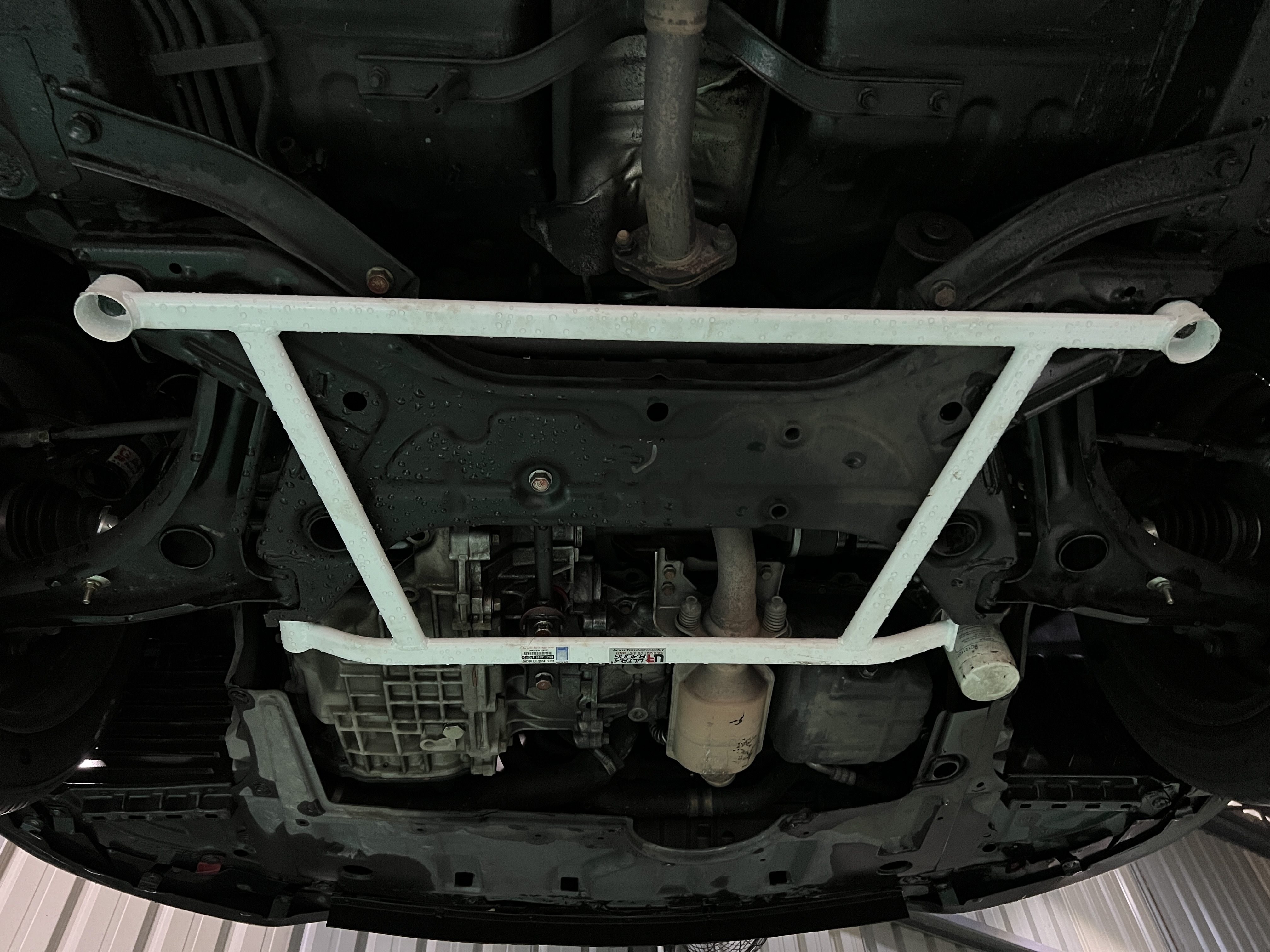 Image of Ultra Racing Voor Veerpootbrug 4 Points Wit Staal Mitsubishi Colt