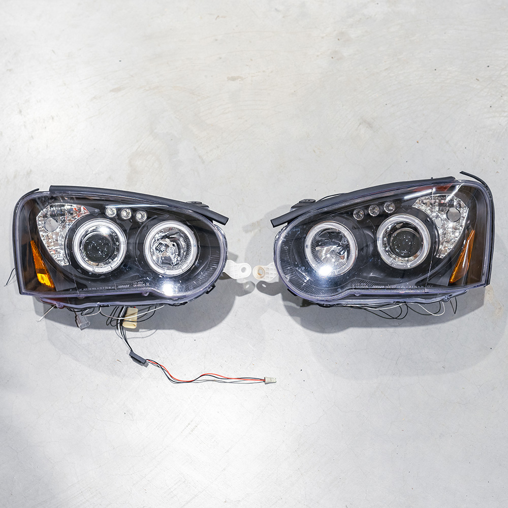 Image of SK-Import Koplampen TWEEDE KANS Gloss Black Housing Smoke Glas Subaru Impreza
