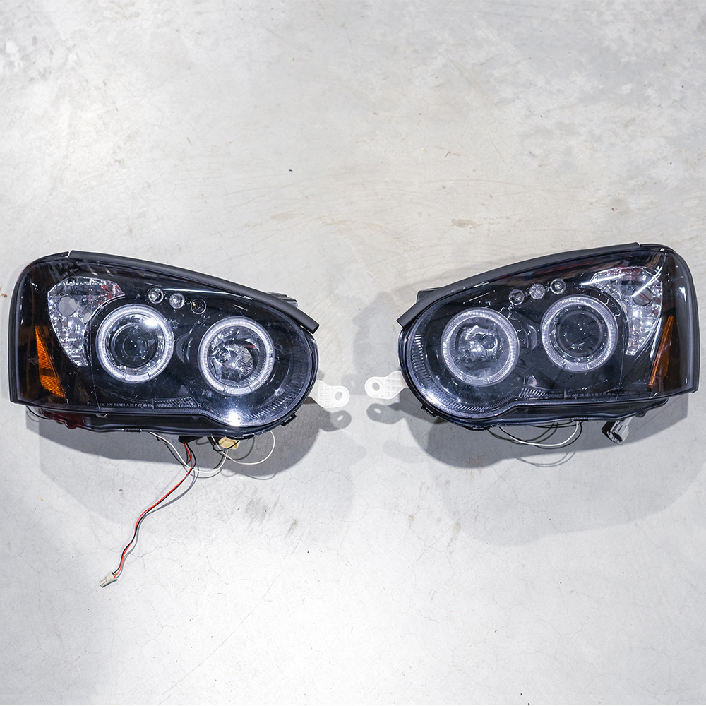 Image of SK-Import Koplampen TWEEDE KANS Gloss Black Housing Smoke Glas Subaru Impreza