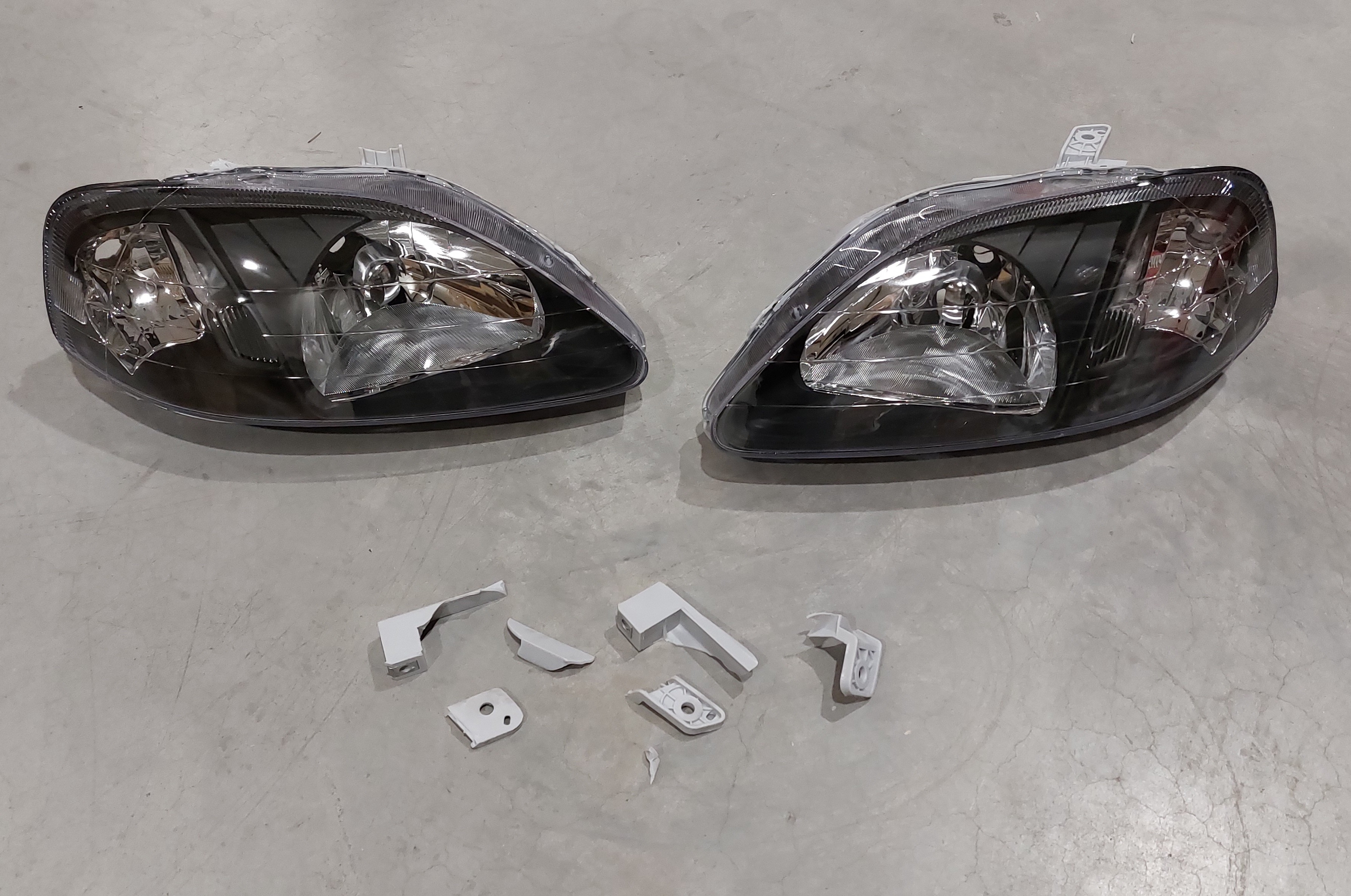 Image of SK-Import Koplampen JDM Style TWEEDE KANS Black Housing Honda Civic Facelift 1999-2001