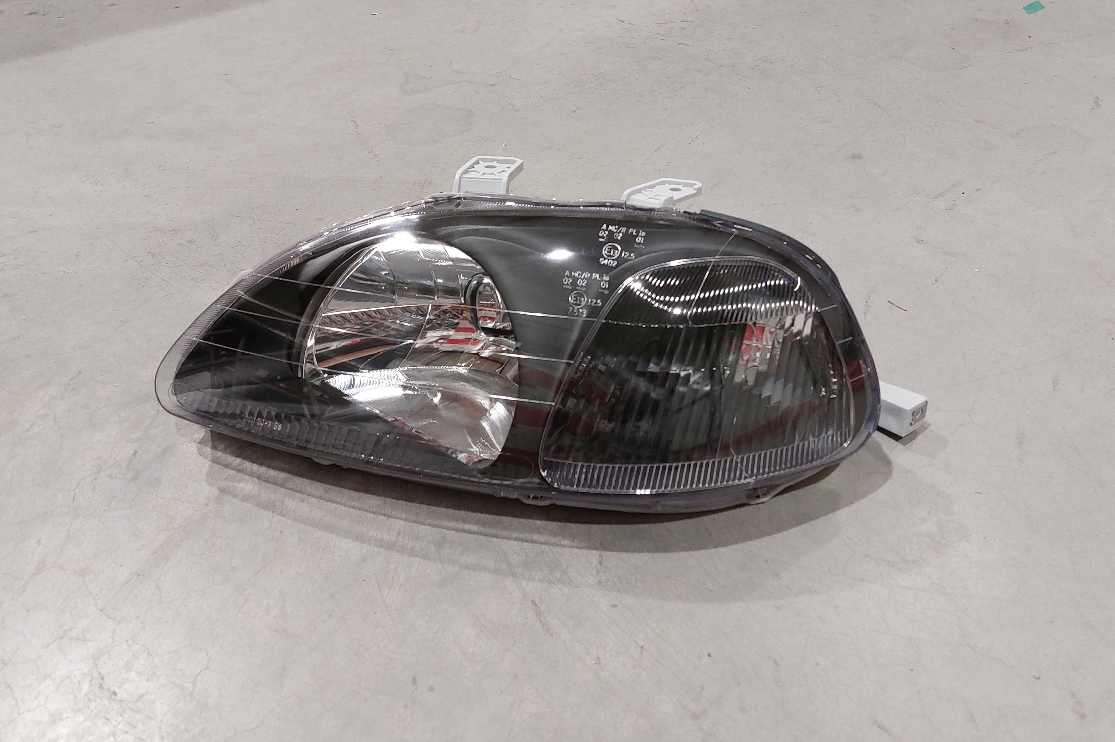 Image of TYC Koplamp JDM TWEEDE KANS Black Housing Honda Civic Pre-Facelift 1996-1998